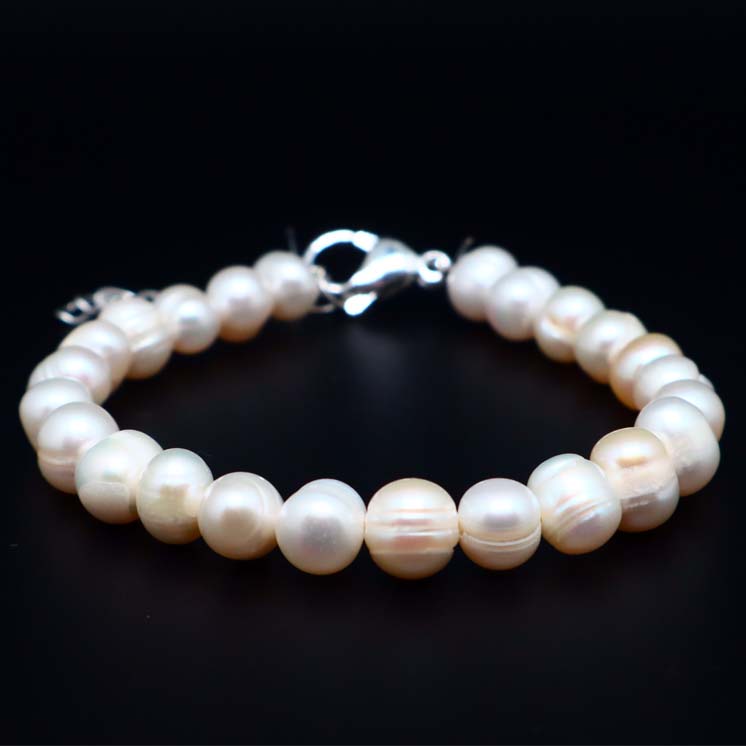 Bracelet perles naturelles orange, beige, blanc, ethnique chic, fermoir